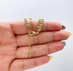 Pulsera doble chapada en oro de 18 quilates con eslabones de clip y cuentas de turquesa.