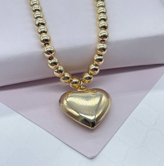 Collar de cuentas de 6 mm en capas de oro de 18 k con dije de corazón hinchado adjunto