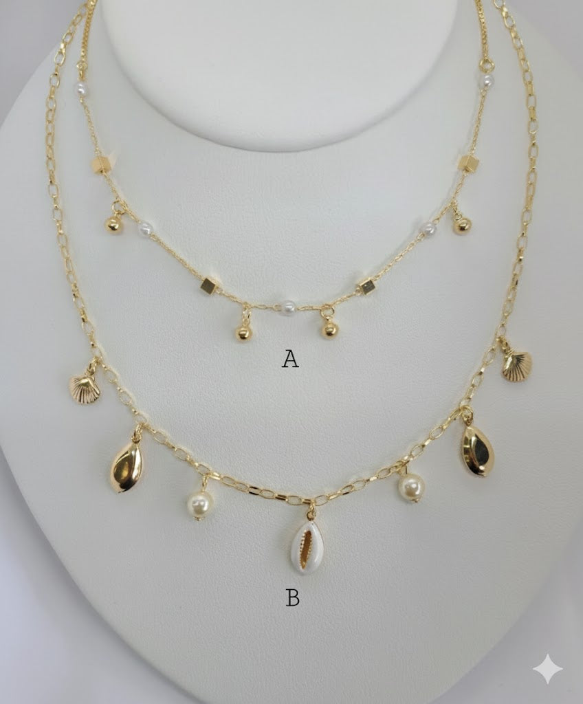 (1-6100) Collar con dijes de perlas y laminado dorado - BGF