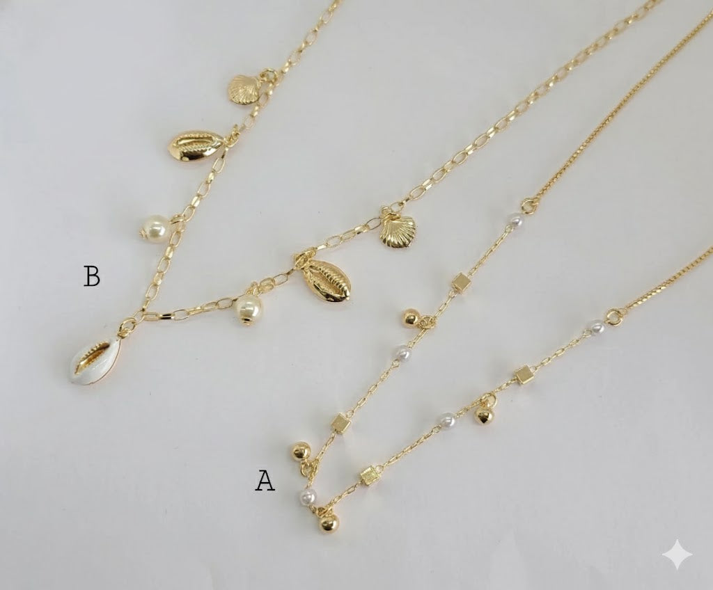 (1-6100) Collar con dijes de perlas y laminado dorado - BGF