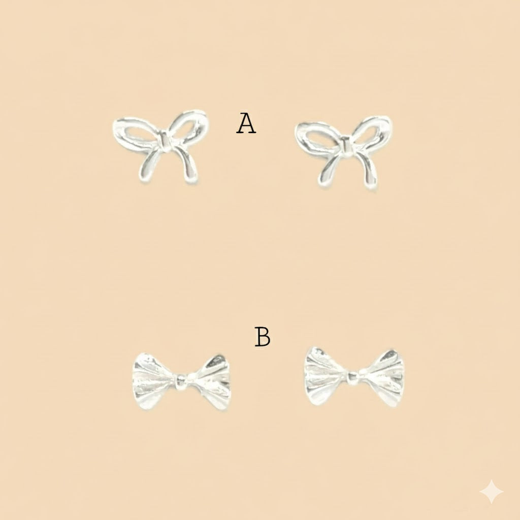 (2-3076) 925 Sterling Silver - Bow Stud Earrings.