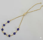 (MBRA-17) Laminado Dorado - Pulsera Ajustable con Ojos - BGF