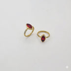 (4-0064) Stainless Steel - Elongated Red Zircon Ring.